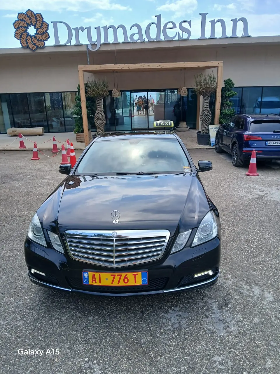 The Dhermi Taxi Mercedes waiting outside Drymades Inn in Dhërmi